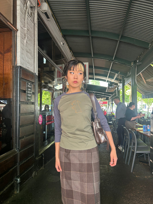 A Colourful Storm Capybara Three-Quarter Raglan Tee